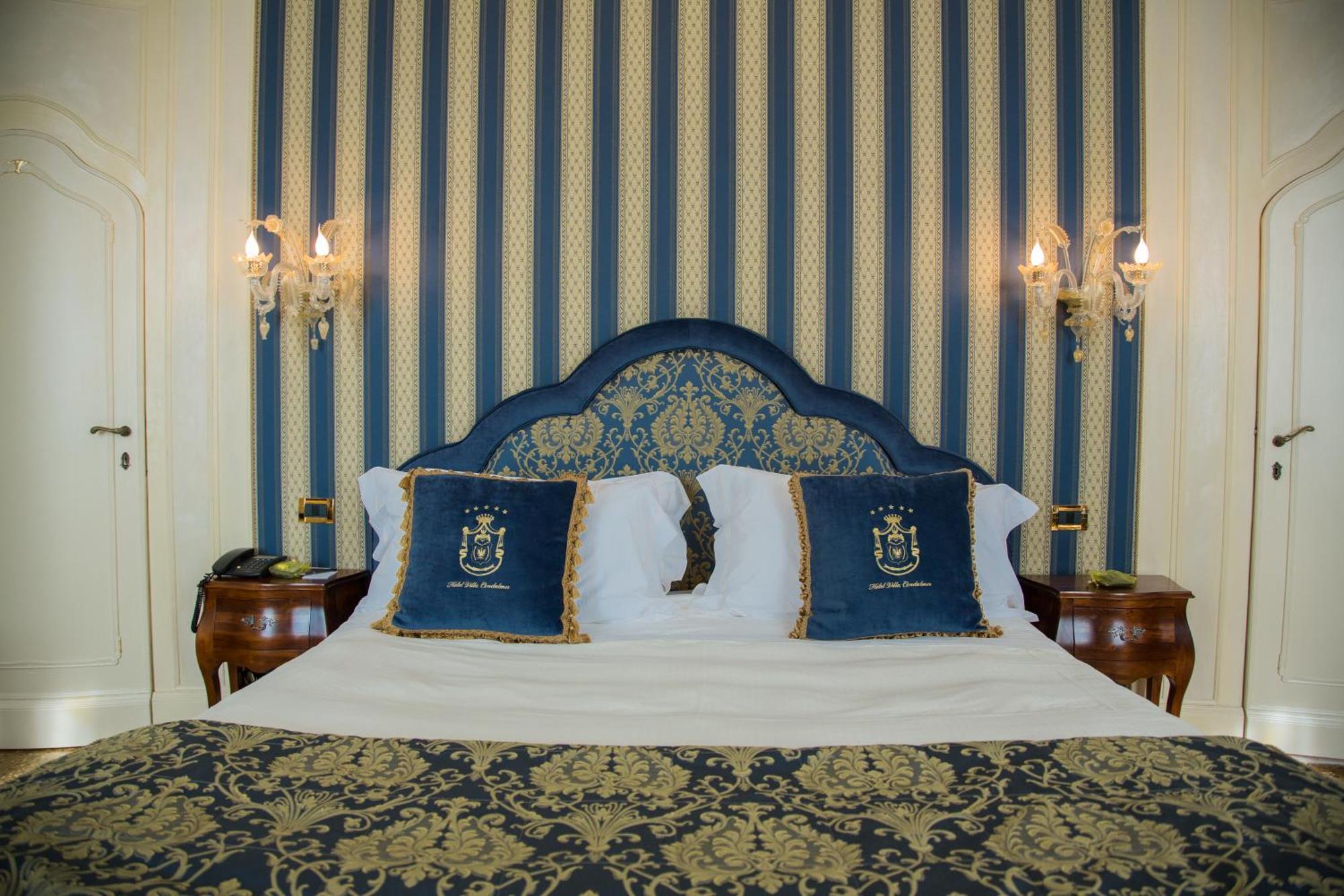 Hotel Villa Condulmer Mogliano Veneto Camera foto A bedroom at the hotel